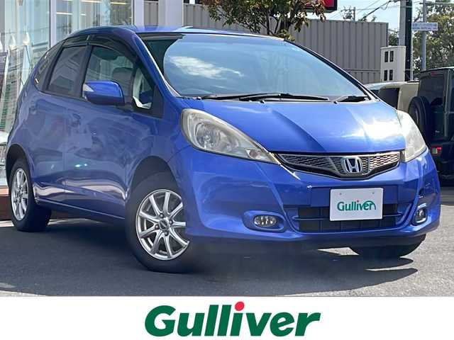 ホンダ フィット G 10thアニバーサリー 道央・札幌 2011(平23)年 6万km アズールブルーメタリック ・4WD/・寒冷地仕様/・社外ナビ/SD&CD&DVD&BT&フルセグTV/・ETC/・ABS/・盗難防止装置/・オートライト/・電動格納ミラー/・ウィンカーミラー/・ドアバイザー/・フォグランプ/・純正フロアマット/・スペアキー1本(インテリジェントキーのみ)/・保証書/・取扱説明書