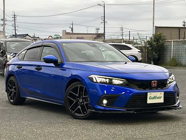 ホンダ シビック EX 愛知県 2024(令6)年 1.5万km プレミアムクリスタルブルークリスタル 登録時走行距離14220km/ワンオーナー/純正9インチSDナビ/(Bluetooth/フルセグTV/USB)/バックカメラ/クリアランスソナー前後/ドラレコ前後/無限フルエアロ/社外マフラー/BOSEスピーカー/ホンダセンシング/衝突軽減ブレーキ/レーンキープアシスト/路外逸脱抑制/アダプティブクルーズコントロール/トラフィックジャムアシスト/先行車発信告知/標識認識機能/踏み間違い衝突軽減/ブラインドスポット/ステアリングスイッチ/ワイヤレス充電器/前席シートヒーター/前席パワーシート/ドライブモードセレクト/パドルシフト/純正ビルドイン2.0ETC/オート防眩ミラー/電子制御パーキングブレーキ/スマートキー/(スペアキー×1)