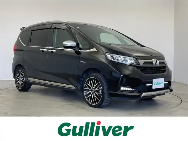 ホンダ フリード ハイブリット クロスター ホンダセンシング 埼玉県 2022(令4)年 4.2万km クリスタルブラックパール ４WD/純正９インチメモリナビ/　CD　DVD　Bluetooth　USB　音楽録音 地デジTV/バックカメラ/サイドカメラ/社外フロントカメラ/両側パワースライドドア/レーダークルーズコントロール/前後ドライブレコーダー/ビルトインETC/ハーフレザーシート/シートヒーター/オートLEDライト/コーナーセンサー/社外１７インチアルミホイール/純正ホイール付スタッドレスタイヤ積み込み