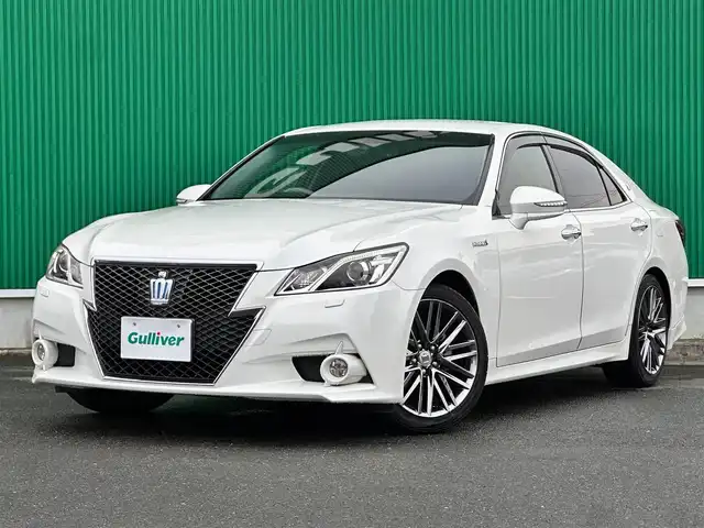 トヨタ クラウン ハイブリッド アスリートG 宮城県 2013(平25)年 10.1万km ホワイトパールクリスタルシャイン 純正HDDナビ/【CD・DVD・MSV・BT・フルセグTV】/バックカメラ/本革シート/エアシート・シートヒーター/クルーズコントロール/純正18インチAW/パワーシート/電動リアサンシェード/電動格納ミラー/社外ウィンカーミラー/フロアマット/ドアバイザー/オートライト/LEDヘッドライト/フォグライト/ビルトインETC/スマートキーX２