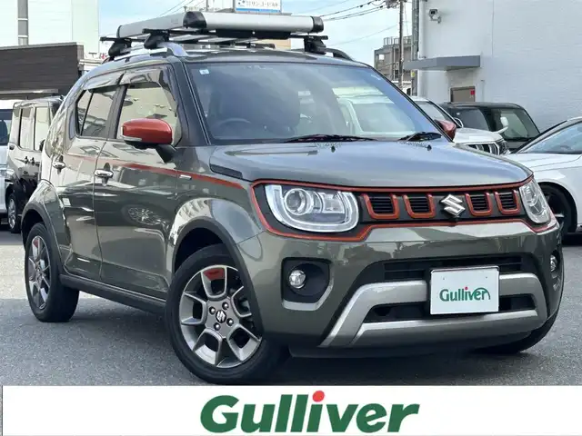 スズキ イグニス ハイブリッド MF 福岡県 2021(令3)年 2.1万km タフカーキパールメタリック ワンオーナー/Panasonic製ナビ【CN-RZ866】/（フルセグTV・BT・CD・DVD・USB）/クルーズコントロール/前席シートヒーター/アラウンドビューモニター/ルーフレール/ダウンヒルアシストコントロール/リアコーナーセンサー/ETC/ドライブレコーダー/アイドリングストップ/ウィンカーミラー/AC100V/LEDヘッドライト/レーンキープアシスト/盗難防止装置/レザーシート/純正フロアマット/純正16インチアルミホイール/プッシュスタート/スマートキー/スペアキー/USB入力端子/カーテンエアバック/ドアバイザー/取扱説明書/保証書/スペアキー