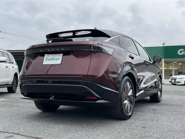 日産 アリア B6 リミテッド 千葉県 2022(令4)年 2万km 赤／黒 プロパイロット2.0/プロパイロットリモートパーキング/パノラミックガラスルーフ/BOSEプレミアムサウンドシステム/ナッパーレザーシート/ヘッドアップディスプレイ/純正12.3インチメモリナビ/インテリジェントアラウンドビューモニター/インテリジェントルームミラー/インテリジェントエマージェンシーブレーキ/ドライバーモニター/前席パワーシート/前席シートベンチレーション/全席シートヒーター/運転席4WAYランバーサポート/インテリジェントBSI/インテリジェントLI/BSW/LDW/リモコンオートバックドア/ステアリングヒーター/ワイヤレス充電器/ETC2.0/純正前後ドライブレコーダー【DH5-S】/サイド＆カーテンエアバッグ