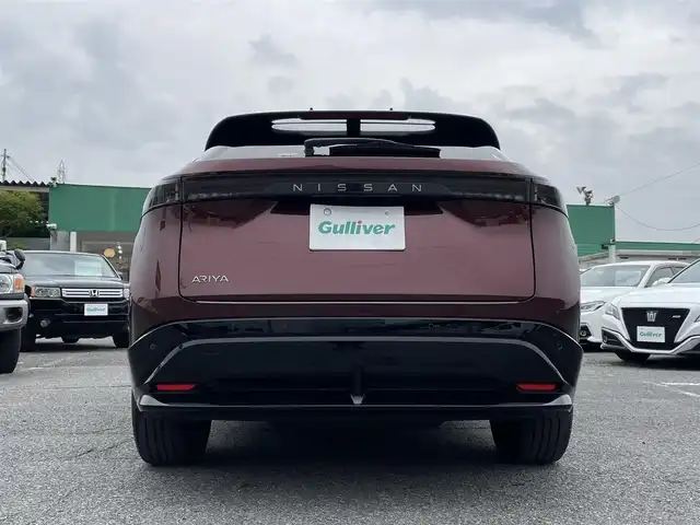 日産 アリア B6 リミテッド 千葉県 2022(令4)年 2万km 赤／黒 プロパイロット2.0/プロパイロットリモートパーキング/パノラミックガラスルーフ/BOSEプレミアムサウンドシステム/ナッパーレザーシート/ヘッドアップディスプレイ/純正12.3インチメモリナビ/インテリジェントアラウンドビューモニター/インテリジェントルームミラー/インテリジェントエマージェンシーブレーキ/ドライバーモニター/前席パワーシート/前席シートベンチレーション/全席シートヒーター/運転席4WAYランバーサポート/インテリジェントBSI/インテリジェントLI/BSW/LDW/リモコンオートバックドア/ステアリングヒーター/ワイヤレス充電器/ETC2.0/純正前後ドライブレコーダー【DH5-S】/サイド＆カーテンエアバッグ