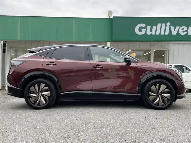 日産 アリア B6 リミテッド 千葉県 2022(令4)年 2万km 赤／黒 プロパイロット2.0/プロパイロットリモートパーキング/パノラミックガラスルーフ/BOSEプレミアムサウンドシステム/ナッパーレザーシート/ヘッドアップディスプレイ/純正12.3インチメモリナビ/インテリジェントアラウンドビューモニター/インテリジェントルームミラー/インテリジェントエマージェンシーブレーキ/ドライバーモニター/前席パワーシート/前席シートベンチレーション/全席シートヒーター/運転席4WAYランバーサポート/インテリジェントBSI/インテリジェントLI/BSW/LDW/リモコンオートバックドア/ステアリングヒーター/ワイヤレス充電器/ETC2.0/純正前後ドライブレコーダー【DH5-S】/サイド＆カーテンエアバッグ