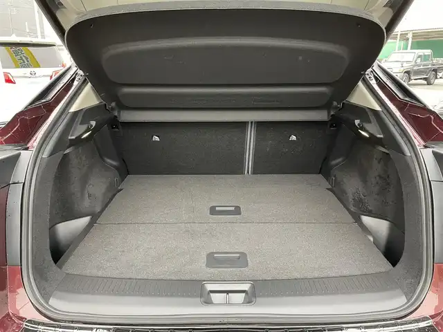 日産 アリア B6 リミテッド 千葉県 2022(令4)年 2万km 赤／黒 プロパイロット2.0/プロパイロットリモートパーキング/パノラミックガラスルーフ/BOSEプレミアムサウンドシステム/ナッパーレザーシート/ヘッドアップディスプレイ/純正12.3インチメモリナビ/インテリジェントアラウンドビューモニター/インテリジェントルームミラー/インテリジェントエマージェンシーブレーキ/ドライバーモニター/前席パワーシート/前席シートベンチレーション/全席シートヒーター/運転席4WAYランバーサポート/インテリジェントBSI/インテリジェントLI/BSW/LDW/リモコンオートバックドア/ステアリングヒーター/ワイヤレス充電器/ETC2.0/純正前後ドライブレコーダー【DH5-S】/サイド＆カーテンエアバッグ