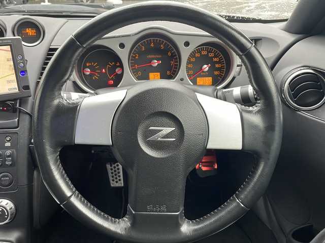 日産 フェアレディ Ｚ バージョンT 愛知県 2005(平17)年 10.6万km プレミアムミスティックマルーン DVDナビ/ワンセグテレビ/バックカメラ/ETC/TCSオフ切り替えスイッチ/前後ドラレコ/レザーシート/シートヒーター/パワーシート/保証書/取扱説明書