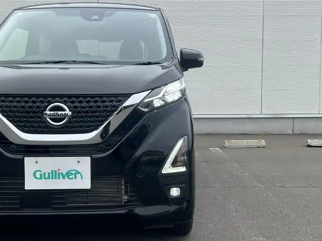 日産 デイズ ハイウェイスターX 秋田県 2021(令3)年 1.4万km ブラック 純正オーディオ（AM/FM/CD）/衝突軽減システム/４WD/全方位カメラ/アラウンドビューモニター/純正アルミ/スマートキー/前席シートヒーター/アイドリングストップ/プッシュスタート/コーナーセンサー/ステアリングスイッチ/純正エンジンスターター/純正フロアマット/純正ドアバイザー/オートライト/オートエアコン/パワーステアリング/パワーウィンドウ/レベライザー/横滑り防止/電動格納ウィンカーミラー/保証書/取扱説明書/記録簿