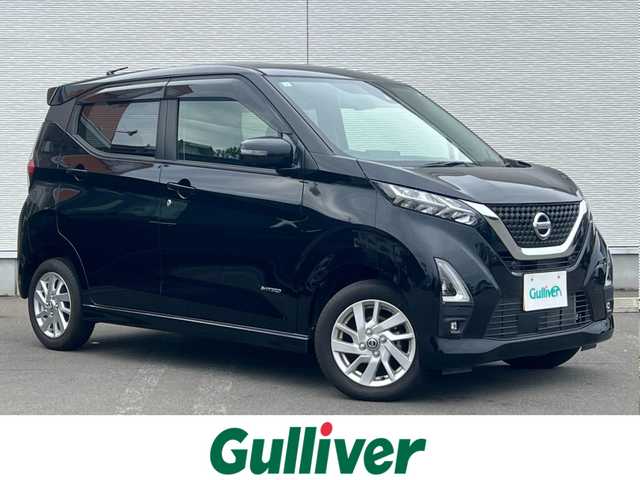 日産 デイズ ハイウェイスターX 秋田県 2021(令3)年 1.4万km ブラック 純正オーディオ（AM/FM/CD）/衝突軽減システム/４WD/全方位カメラ/アラウンドビューモニター/純正アルミ/スマートキー/前席シートヒーター/アイドリングストップ/プッシュスタート/コーナーセンサー/ステアリングスイッチ/純正エンジンスターター/純正フロアマット/純正ドアバイザー/オートライト/オートエアコン/パワーステアリング/パワーウィンドウ/レベライザー/横滑り防止/電動格納ウィンカーミラー/保証書/取扱説明書/記録簿