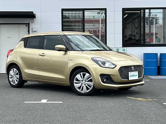 スズキ スイフト HYBRID ML 山口県 2017(平29)年 10.5万km ヘリオスゴールドPM ワンオーナー/純正SDナビ【CN－RZ73W】/・CD/DVD/AM/FM/iPod/USB/Bluetooth/フルセグテレビ/ETC/ドライブレコーダー/全方位カメラ/スマートキー・スペアキー有/プッシュアップスタート/運転席シートヒーター/フルオートエアコン/純正フロアマット/16インチ純正アルミホイール/電動格納ウインカーミラー/LEDヘッドランプ/フォグランプ/オートライト/アイドリングストップ/追従有クルーズコントロール/横滑り防止装置/デュアルセンサーブレーキサポート/レーンアシスト/盗難防止装置/取扱説明書/保証書