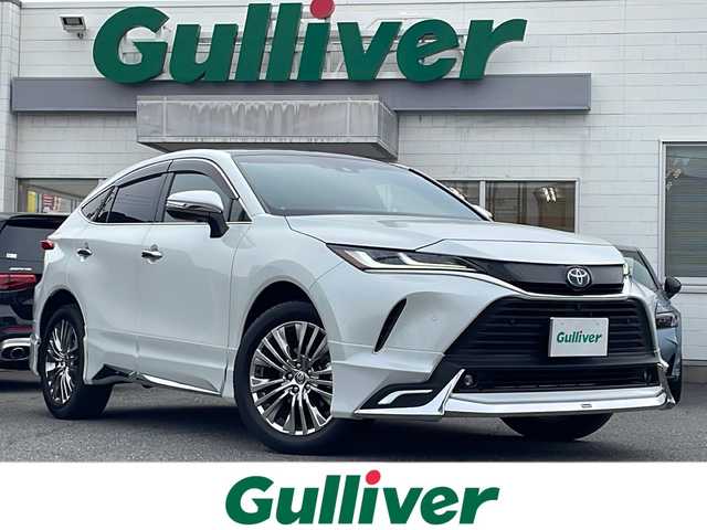 トヨタ ハリアー ハイブリッド Z 千葉県 2024(令6)年 1.7万km プラチナホワイトパールマイカ メーカーオプション/・調光パノラマルーフ/・パノラミックビューモニター/セーフティセンス/・プリクラッシュセーフティ/・レーントレーシングアシスト/・レーダークルーズコントロール/・アダプティブハイビームアシスト/・ロードサインアシスト/・カーブ速度抑制機能/・ドライバー異常時対応システム/・横断歩行者検知機能/・低速時加速抑制機能/・緊急時操舵支援/ブラインドスポットモニター/パーキングサポートブレーキ/1オーナー/モデリスタエアロ/JBLプレミアムサウンドシステム/純正12.3型ナビ/フルセグTV/【Bluetooth/USB/Miracast】/ビルトインETC/デジタルインナーミラー/カラーヘッドアップディスプレイ/パワーバックドア/ハーフレザーシート/D席パワーシート/オートライト/プロジェクター式LEDヘッドランプ/デイタイムランニングランプ/LEDフロントフォグランプ/プッシュスタート/スマートキー/スペアキー