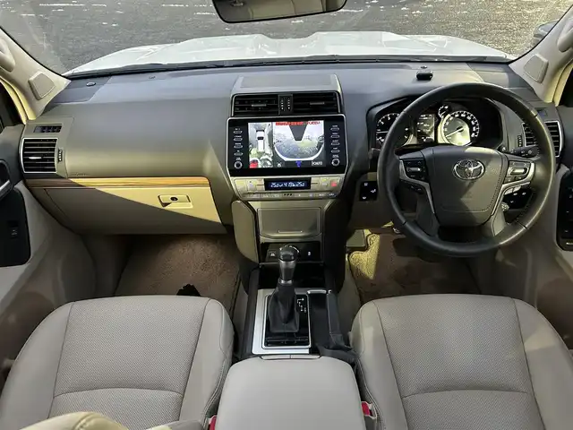 トヨタ ランドクルーザー プラド TX Lパッケージ 宮城県 2023(令5)年 3.8万km ホワイトパールクリスタルシャイン ワンオーナー/純正メーカーナビ/ＡＭ／ＦＭ／Ｂｌｕｅｔｏｏｔｈ／ＵＳＢ/Ｍｉｒａｃａｓｔ/レーダークルーズコントロール/ブラインドスポットモニター/プリクラッシュセーフティ/横滑り防止装置/オートハイビーム/アラウンドビューモニター/シートヒーター/エアーシート/前席パワーシート/セカンドスタートボタン/エンジンスターター/スペアタイヤ/純正フロアマット/純正赤外線カットフィルム/ETC2.0/純正AWサマータイヤ有265/55R19溝4mm