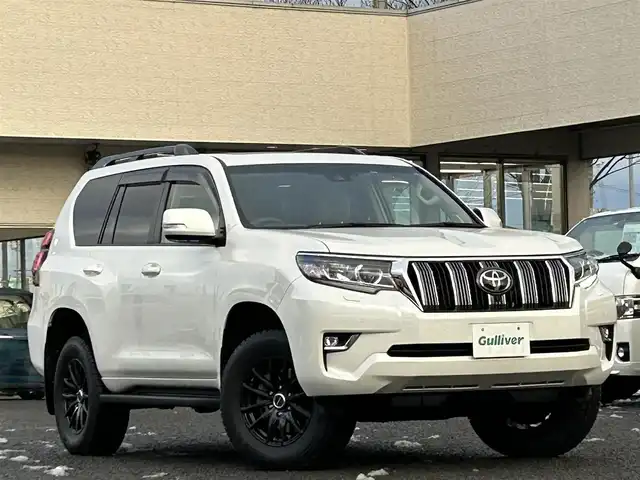 トヨタ ランドクルーザー プラド TX Lパッケージ 宮城県 2023(令5)年 3.8万km ホワイトパールクリスタルシャイン ワンオーナー/純正メーカーナビ/ＡＭ／ＦＭ／Ｂｌｕｅｔｏｏｔｈ／ＵＳＢ/Ｍｉｒａｃａｓｔ/レーダークルーズコントロール/ブラインドスポットモニター/プリクラッシュセーフティ/横滑り防止装置/オートハイビーム/アラウンドビューモニター/シートヒーター/エアーシート/前席パワーシート/セカンドスタートボタン/エンジンスターター/スペアタイヤ/純正フロアマット/純正赤外線カットフィルム/ETC2.0/純正AWサマータイヤ有265/55R19溝4mm