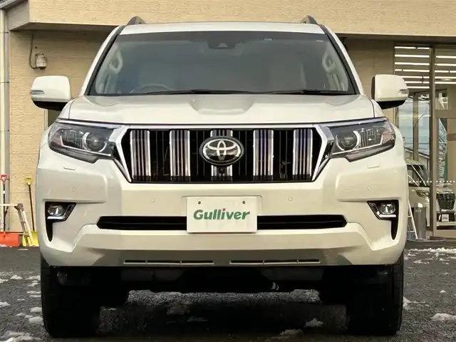 トヨタ ランドクルーザー プラド TX Lパッケージ 宮城県 2023(令5)年 3.8万km ホワイトパールクリスタルシャイン ワンオーナー/純正メーカーナビ/ＡＭ／ＦＭ／Ｂｌｕｅｔｏｏｔｈ／ＵＳＢ/Ｍｉｒａｃａｓｔ/レーダークルーズコントロール/ブラインドスポットモニター/プリクラッシュセーフティ/横滑り防止装置/オートハイビーム/アラウンドビューモニター/シートヒーター/エアーシート/前席パワーシート/セカンドスタートボタン/エンジンスターター/スペアタイヤ/純正フロアマット/純正赤外線カットフィルム/ETC2.0/純正AWサマータイヤ有265/55R19溝4mm