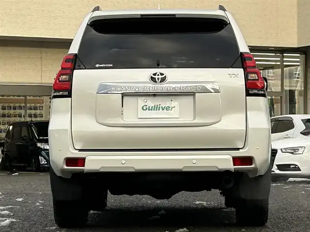 トヨタ ランドクルーザー プラド TX Lパッケージ 宮城県 2023(令5)年 3.8万km ホワイトパールクリスタルシャイン ワンオーナー/純正メーカーナビ/ＡＭ／ＦＭ／Ｂｌｕｅｔｏｏｔｈ／ＵＳＢ/Ｍｉｒａｃａｓｔ/レーダークルーズコントロール/ブラインドスポットモニター/プリクラッシュセーフティ/横滑り防止装置/オートハイビーム/アラウンドビューモニター/シートヒーター/エアーシート/前席パワーシート/セカンドスタートボタン/エンジンスターター/スペアタイヤ/純正フロアマット/純正赤外線カットフィルム/ETC2.0/純正AWサマータイヤ有265/55R19溝4mm