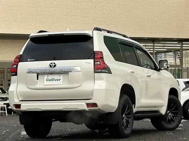 トヨタ ランドクルーザー プラド TX Lパッケージ 宮城県 2023(令5)年 3.8万km ホワイトパールクリスタルシャイン ワンオーナー/純正メーカーナビ/ＡＭ／ＦＭ／Ｂｌｕｅｔｏｏｔｈ／ＵＳＢ/Ｍｉｒａｃａｓｔ/レーダークルーズコントロール/ブラインドスポットモニター/プリクラッシュセーフティ/横滑り防止装置/オートハイビーム/アラウンドビューモニター/シートヒーター/エアーシート/前席パワーシート/セカンドスタートボタン/エンジンスターター/スペアタイヤ/純正フロアマット/純正赤外線カットフィルム/ETC2.0/純正AWサマータイヤ有265/55R19溝4mm