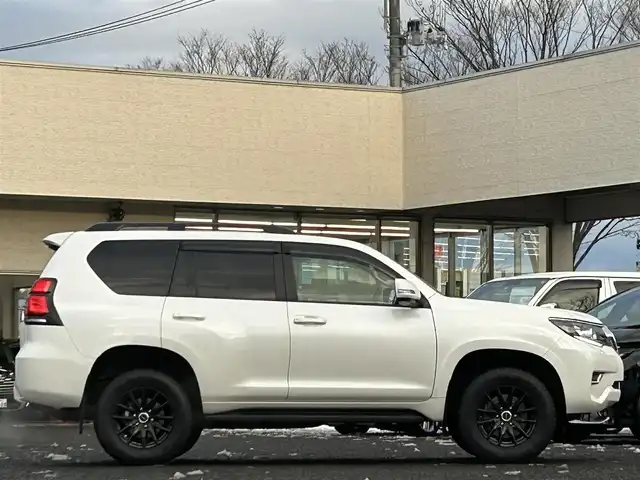 トヨタ ランドクルーザー プラド TX Lパッケージ 宮城県 2023(令5)年 3.8万km ホワイトパールクリスタルシャイン ワンオーナー/純正メーカーナビ/ＡＭ／ＦＭ／Ｂｌｕｅｔｏｏｔｈ／ＵＳＢ/Ｍｉｒａｃａｓｔ/レーダークルーズコントロール/ブラインドスポットモニター/プリクラッシュセーフティ/横滑り防止装置/オートハイビーム/アラウンドビューモニター/シートヒーター/エアーシート/前席パワーシート/セカンドスタートボタン/エンジンスターター/スペアタイヤ/純正フロアマット/純正赤外線カットフィルム/ETC2.0/純正AWサマータイヤ有265/55R19溝4mm
