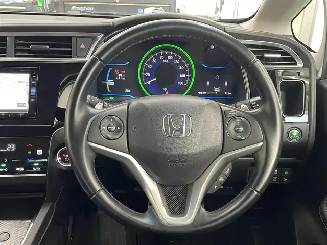 ホンダ シャトル ハイブリッド Z 宮城県 2016(平28)年 10.5万km クリスタルブラックパール ワンオーナー/ルーフレーン/社外デジタルインナーミラー/フロントワイパーデアイサー/純正メモリナビ/BT/FM/AM/CD/DVD/ワンセグテレビ/純正アルミ夏タイヤ16インチ/社外アルミ冬タイヤ15インチ/シートヒーター/バックカメラ/ドライブレコーダー/クルーズコントロール/ETC/プッシュスタート/保証書・記録簿・取扱説明書