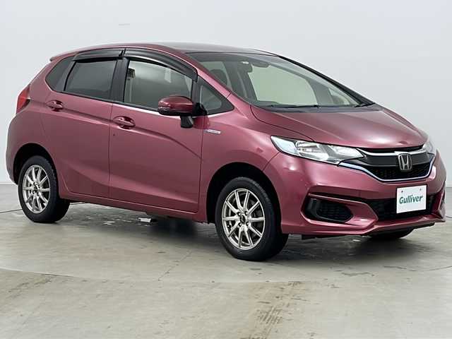 ホンダ フィット ハイブリット F 道央・札幌 2018(平30)年 7.6万km ルージュアメジストM ４WD/ワンオーナー/社外ナビ/・Bluetooth/CD/DVD/TV/バックカメラ/純正ETC/純正フロアマット/社外１５インチAW/LEDライト/寒冷地仕様/クルーズコントロール追走あり/スペアキー/スマートキー/保証書/取り扱い説明書