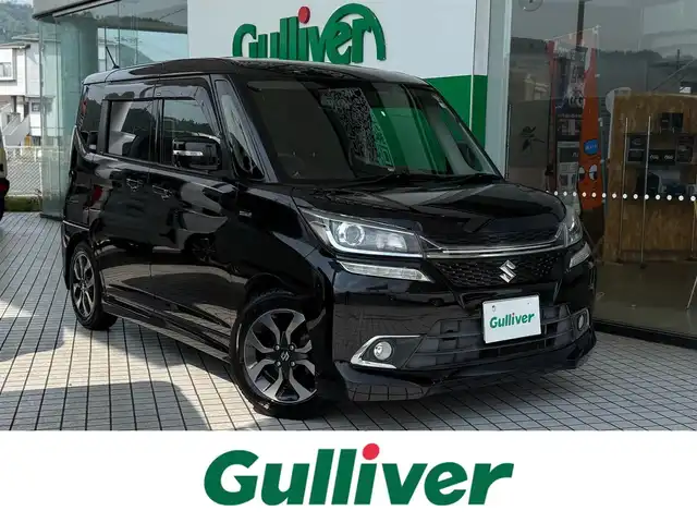 スズキ ソリオ バンディット HV MV 京都府 2016(平28)年 11.2万km スーパーブラックパール 4WD/ワンオーナー/記録簿R1、R3、R5/デュアルカメラブレーキサポート/誤発進抑制機能/車線逸脱警報機能/ふらつき警報機能/クルーズコントロール/カロッツェリア8インチメモリーナビ、地デジ/  Bluetooth/CD/DVD/バックカメラ/ユピテル前後ドライブレコーダー/ステアリングスイッチ/ビルトインETC/LEDヘッドランプ/両側パワースライドドア /社外本革調シートカバー/保証書/取扱説明書/スペアキー