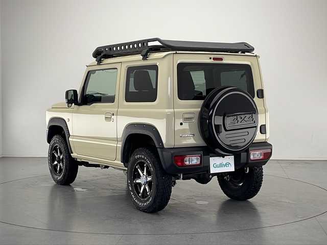 スズキ ジムニー XL 長野県 2020(令2)年 2.1万km シフォンアイボリーM 4WD/社外SDナビ/Bluetooth/CD/DVD/フルセグTV/ETC/バック・フロントカメラ/前方カメラモニター/シートヒーター/横滑り防止装置/衝突被害軽減システム/盗難防止装置/ドアミラーヒーター/ライトデベライザー/ルーフラック/純正16インチAW装着/純正フロアマット/スペアタイヤ/スペアタイヤカバー/背面タイヤ/オートライト/オートマチックハイビーム/LEDヘッドライト/スマートキー/スペアキー1本
