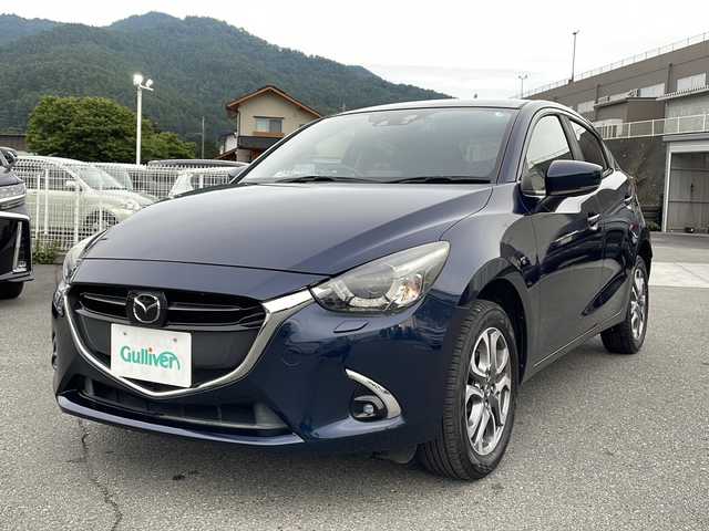 マツダ デミオ XD ツーリング Lパッケージ 山梨県 2016(平28)年 4.5万km ディープクリスタルブルーマイカ 純正ＳＤナビ　/フルセグＴＶ　/バックカメラ　/純正ビルトインＥＴＣ　/ＵＳＢ　/ＣＤ　/Ｂｌｕｅｔｏｏｔｈ　/ドラレコ　/ハーフレザーシート　/前席シートヒーター　/横滑り防止装置　/レーンキープアシスト　/オートエアコン