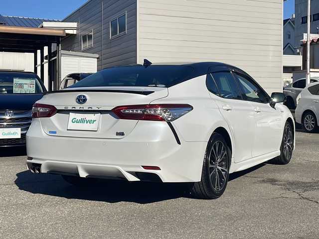 トヨタ カムリ WS 福井県 2019(令1)年 5.1万km アティチュードブラックマイカ/プラチナホワイトパールマイカ ワンオーナー/メーカーナビゲーション/フルセグテレビ/バックカメラ/プリクラッシュセーフティ/レーンキープアシスト/ヘッドアップディスプレイ/ブラインドスポットモニター/アダプティブクルーズコントロール/パドルシフト/ハーフレザーシート/D席パワーシート/ETC（ビルトイン）/クリアランスソナー/LEDヘッドライト/LEDフォグランプ/USBポート/純正18インチアルミホイール/前後ドライブレコーダー/ミラーヒーター/オートハイビーム/オートライト/オートリトラミラー/ステアリングリモコン/プッシュスタート/スマートキー/保証書/取扱説明書