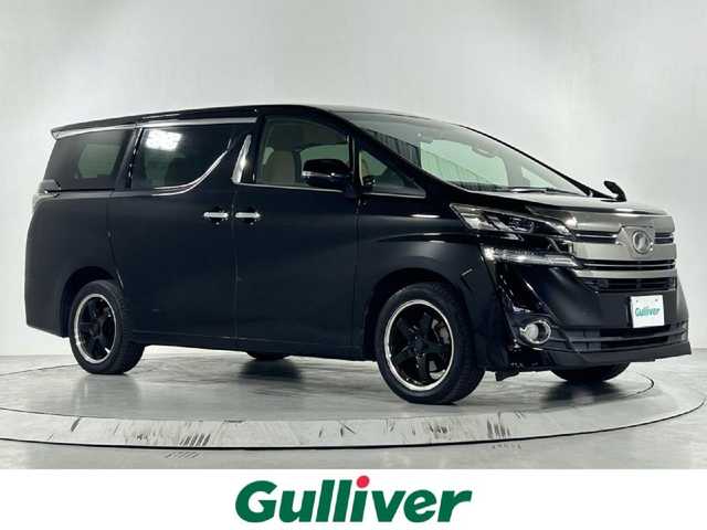 トヨタ ヴェルファイア X 佐賀県 2016(平28)年 14.2万km ブラック 純正ＳＤナビ　/フリップダウンモニター　/４ＷＤ　/横滑り防止　/先行車発進告知機能　/前後コーナーセンサー　/アイドリングストップ　/電動パーキングブレーキ　/ブレーキホールド　/片側パワスラ　/バックカメラ/社外18インチアルミ/純正フロアマット/オートライト/電格ミラー