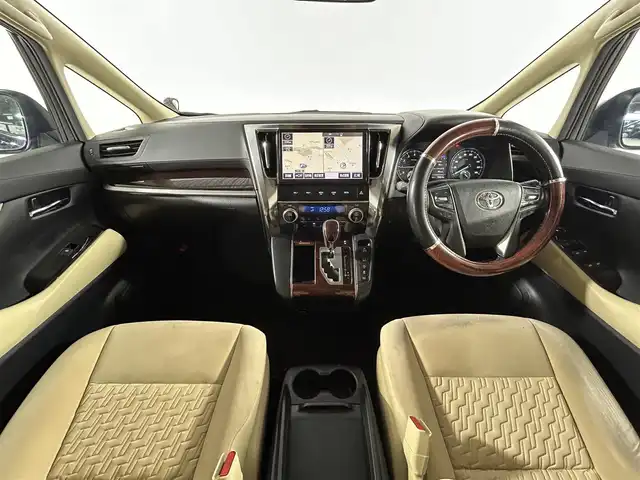 トヨタ ヴェルファイア X 佐賀県 2016(平28)年 14.2万km ブラック 純正ＳＤナビ　/フリップダウンモニター　/４ＷＤ　/横滑り防止　/先行車発進告知機能　/前後コーナーセンサー　/アイドリングストップ　/電動パーキングブレーキ　/ブレーキホールド　/片側パワスラ　/バックカメラ/社外18インチアルミ/純正フロアマット/オートライト/電格ミラー