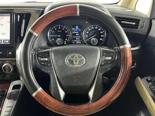 トヨタ ヴェルファイア X 佐賀県 2016(平28)年 14.2万km ブラック 純正ＳＤナビ　/フリップダウンモニター　/４ＷＤ　/横滑り防止　/先行車発進告知機能　/前後コーナーセンサー　/アイドリングストップ　/電動パーキングブレーキ　/ブレーキホールド　/片側パワスラ　/バックカメラ/社外18インチアルミ/純正フロアマット/オートライト/電格ミラー