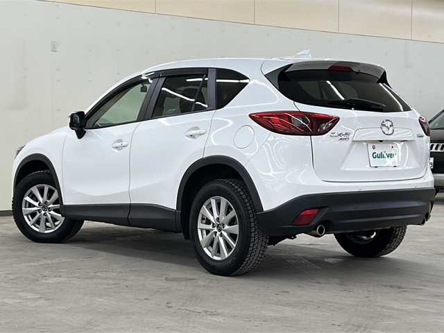 マツダ ＣＸ－５ 25S プロアクティブ 道央・札幌 2015(平27)年 5.6万km クリスタルホワイトパールマイカ ・４ＷＤ/・寒冷地仕様/・マツダ純正ナビ（TV/DVD/AM/FM/BT）/・バックカメラ/・クリアランスソナー/・衝突軽減ブレーキ/・車間認知支援システム/・ブラインドスポットモニタリング/・トラクションコントロール/・どD/AM/FM/BT）/・バックカメラ/・ソナー前後/・衝突軽減ブレーキ/・車間認知支援システム/・ブラインドスポットモニタリング/・トラクションコントロール/・ドライバーアテンションアラート/・クルーズコントロール（追従機能付）/・ステアリングスイッチ/・電動パーキングブレーキ/・ＢＯＳＥサウンドシステム/・ＵＳＢポート×２/・LEDヘッドライト/・フォグランプ/・オートライト/・ヘッドランプウォッシャー/・社外ETC/・社外ドライブレコーダー/・純正エンジンスターター/・スマートキー/・スペアキー/・プッシュスタート