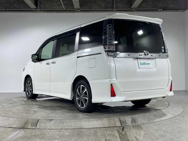 トヨタ ヴォクシー ZS 煌 福岡県 2019(平31)年 8.5万km ホワイトパールクリスタルシャイン 社外8型ナビ/・Bluetooth/・CD/DVD/・フルセグテレビ/バックカメラ/ALPINEフリップダウンモニター/両側パワースライドドア/衝突軽減ブレーキ/レーンキープアシスト/オートマチックハイビーム/クルーズコントロール/ETC/LEDヘッドライト