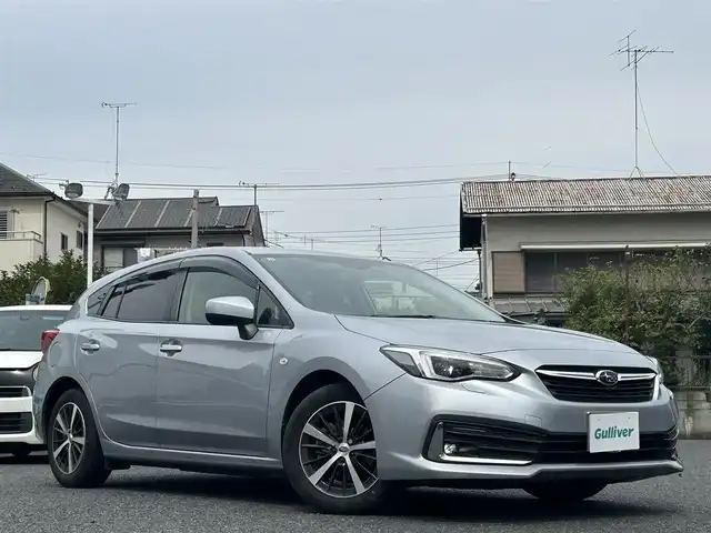 スバル インプレッサ スポーツ 1．6i－Lアイサイト 東京都 2019(令1)年 2万km アイスシルバーメタリック 純正ナビ/・Bluetooth/TV/CD/DVD/USB/EyeSight/・プリクラッシュブレーキ/・ツーリングアシスト/・全車速追従機能付きクルーズコントロール/・車線中央維持　先行車追従操舵機能/・車線逸脱抑制機能/・AT誤発進抑制機能/・AT誤後進抑制機能/・車線逸脱警報/・ふらつき警報/・先行車発進お知らせ/・定速クルーズコントロール/・後退時ブレーキアシスト/オートライト/バックカメラ/ブラインドスポットモニター/電動格納ミラー/横滑り防止装置/盗難防止装置/コーナーセンサー/16インチ純正ホイール/ETC/取扱説明書/保証書