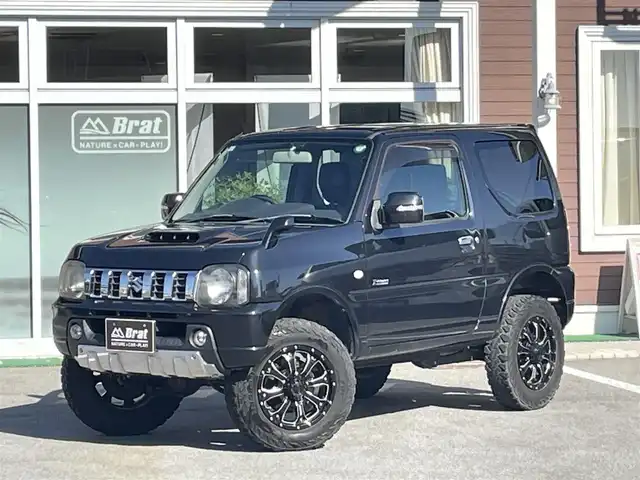 スズキ ジムニー クロスアドベンチャー 栃木県 2012(平24)年 13.5万km ブルーイッシュブラックパール3 リフトアップ/MKW　MK-46アルミホイール /ヨコハマジオランダータイヤ /LEDサンダーデカール /Bratオリジナルウイング /ケンウッドナビ【MDV-D706BT】 /CD/DVD/Bluetooth/フルセグTV/バックカメラ/D席シートヒーター　/ETC　/スタッドレスタイヤ4本積み込み/純正コイル等有