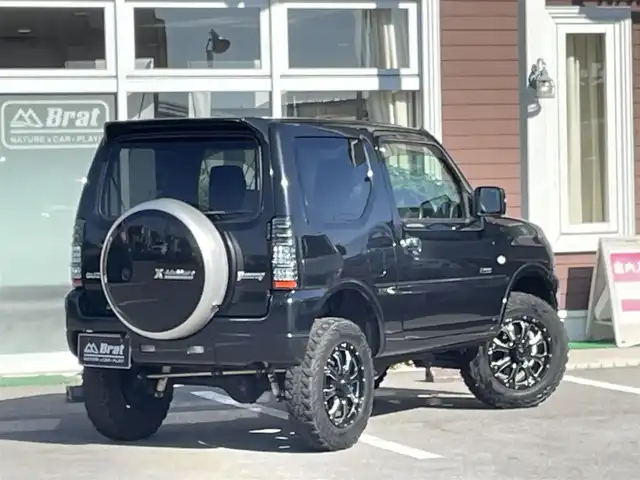 スズキ ジムニー クロスアドベンチャー 栃木県 2012(平24)年 13.5万km ブルーイッシュブラックパール3 リフトアップ/MKW　MK-46アルミホイール /ヨコハマジオランダータイヤ /LEDサンダーデカール /Bratオリジナルウイング /ケンウッドナビ【MDV-D706BT】 /CD/DVD/Bluetooth/フルセグTV/バックカメラ/D席シートヒーター　/ETC　/スタッドレスタイヤ4本積み込み/純正コイル等有