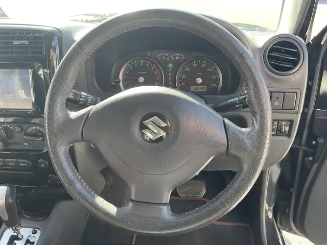 スズキ ジムニー クロスアドベンチャー 栃木県 2012(平24)年 13.5万km ブルーイッシュブラックパール3 リフトアップ/MKW　MK-46アルミホイール /ヨコハマジオランダータイヤ /LEDサンダーデカール /Bratオリジナルウイング /ケンウッドナビ【MDV-D706BT】 /CD/DVD/Bluetooth/フルセグTV/バックカメラ/D席シートヒーター　/ETC　/スタッドレスタイヤ4本積み込み/純正コイル等有