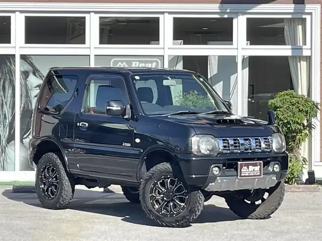 スズキ ジムニー クロスアドベンチャー 栃木県 2012(平24)年 13.5万km ブルーイッシュブラックパール3 リフトアップ/MKW　MK-46アルミホイール /ヨコハマジオランダータイヤ /LEDサンダーデカール /Bratオリジナルウイング /ケンウッドナビ【MDV-D706BT】 /CD/DVD/Bluetooth/フルセグTV/バックカメラ/D席シートヒーター　/ETC　/スタッドレスタイヤ4本積み込み/純正コイル等有