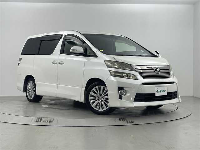 トヨタ ヴェルファイア 2．4Z 埼玉県 2013(平25)年 8万km ホワイトパールクリスタルシャイン 純正7型ナビ（BT/フルTV/AM/FM/CD）/バックカメラ/10型フリップダウンモニター/トヨタセーフティーセンス/両側パワースライドドア/前後コーナーセンサー/純正18インチアルミホイール/純正フロアマット/社外前後ドラレコ/キセノンライト
