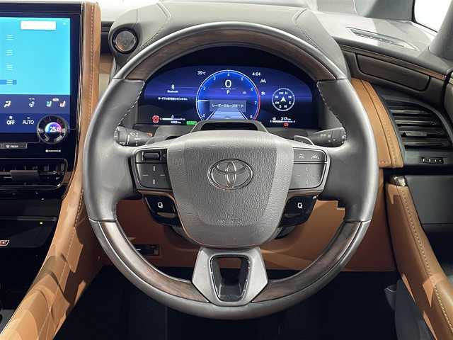 トヨタ ヴェルファイア ハイブリット Z プレミア 愛知県 2024(令6)年 0.5万km プラチナホワイトパールマイカ 純正１４インチディスプレイオーディオＰｌｕｓ　/（Bluetooth/FM/AM/フルセグTV/CarPlay/Miracast)/ユニバーサルステップ　/モデリスタフルエアロ　/純正フリップダウンモニター　/左右独立ムーンルーフ/パノラミックビューモニター/トヨタチームメイト　/　　・アドバンスパーク＋パーキングサポートブレーキ/トヨタセーフティセンス　/　　-プリクラッシュセーフティ/　　-レーントレーニングアシスト/　　-レーダークルーズコントロール/　　-アダプティブハイビームシステム［AHS］/　　-ロードサインアシスト［RSA］/　　-ドライバー異常時対応システム/　　-プロアクティブドライビングアシスト［PDA］/　　-発進遅れ告知機能［TMN］/電動バックドア/両側パワースライドドア/茶レザーシート/シートベンチレーション/シートヒーター/ビルトインETC2.0/AC100V/ワイヤレス充電/三眼LEDヘッドライト/LEDフォグ/ヘッドアップディスプレイ/ブラインドスポットモニター/ステアリングヒーター/メモリー機能付パワーシート/バック・サイド・フロントカメラ/前後ドライブレコーダー/パドルシフト/オットマン