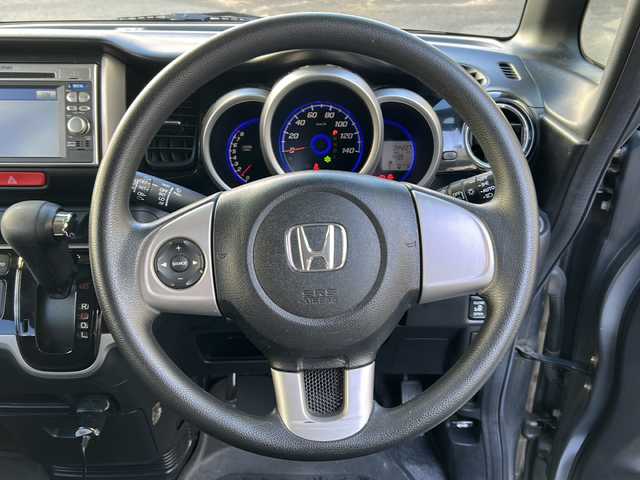 ホンダ Ｎ ＢＯＸ カスタム G Lパッケージ 埼玉県 2012(平24)年 4.5万km ポリッシュドメタルメタリック 純正メモリナビ/CD/DVD/ワンセグ/SD/USB/バックカメラ/片側パワースライドドア/プッシュスタート/スマートキー/純正エアロ（サイド、リアスポイラー）/純正14インチアルミホイール（オールシーズンタイヤ）/電動格納ミラー/ウィンカーミラー/オートライト/前後ドラレコ/HID/フォグランプ/ETC/横滑り防止機能/純正フロアマット/保証書/取扱説明書