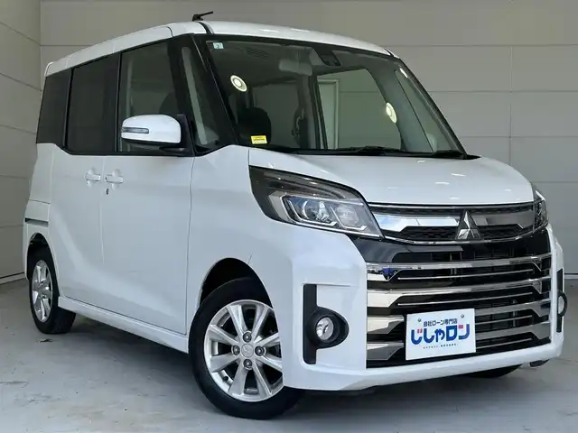 三菱 ｅＫスペース カスタムG e－アシスト 沖縄県 2017(平29)年 4.2万km シルキーホワイト (株)IDOMが運営する【じしゃロンOO店】の自社ローン専用車両になりますこちらは現金またはオートローンご利用時の価格です。自社ローンご希望の方は別途その旨お申付け下さい/・プッシュスタート　/・ナビ　/・ＴＶ　/・Ｂｌｕｅｔｏｏｔｈ接続　/・純正アルミホイール　/・ＥＴＣ　/・純正フロアマット　/・片側パワースライドドア　/・シートヒーター　/・横滑り防止装置　/・衝突被害軽減システム