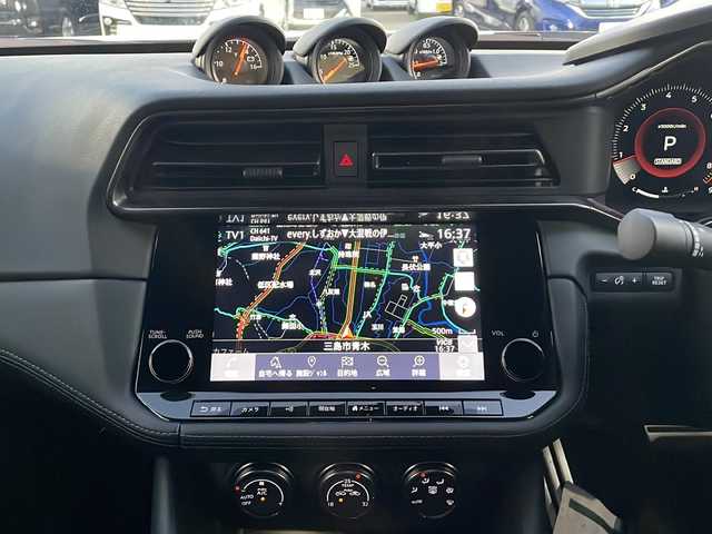 日産 フェアレディ Ｚ バージョンST 静岡県 2024(令6)年 0.9万km パールⅡ /ワンオーナー//純正ナビ/地デジTV//Bluetooth//バックカメラ//純正19インチAW//パドルシフト//レーダークルーズコントロール//3連メーター//LEDヘッドライト//シートヒーター//保証書//取説