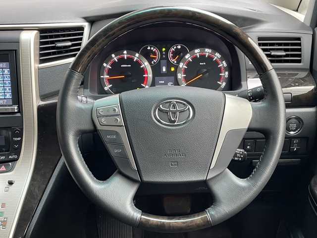 トヨタ ヴェルファイア 2．4Z ゴールデンアイズⅡ 福島県 2014(平26)年 2.1万km ホワイトパールクリスタルシャイン プッシュスタート/パーキングソナー/クルーズコントロール/パノラマモニター/ツインサンルーフ/木目ステアリングスイッチ/両側パワースライドドア/パワーバックドア/２列目オットマン/ハーフレザー/純正１８インチアルミ/純正フロアマット/純正ドライブレコーダー/ETC