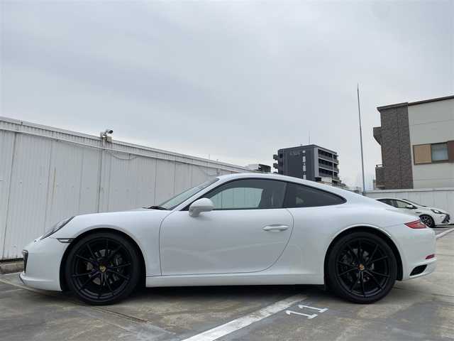 ポルシェ ９１１ カレラ 広島県 2016(平28)年 3万km 白 スポーツクロノパッケージ/スポーツエグゾーストシステム/GTスポーツステアリングレザー/　・インテリアパッケージ/ブラックペイント20インチアルミホイール/LEDメインブラックヘッドライト・PDLS含む/ポルシェエントリー・ドライブシステム/スポーツデザインエクステリアミラー/スマートキー・フロアマット/グレートップウィンドスクリーン/保証書あり/取り扱い説明書あり/純正ナビ/フルセグTV