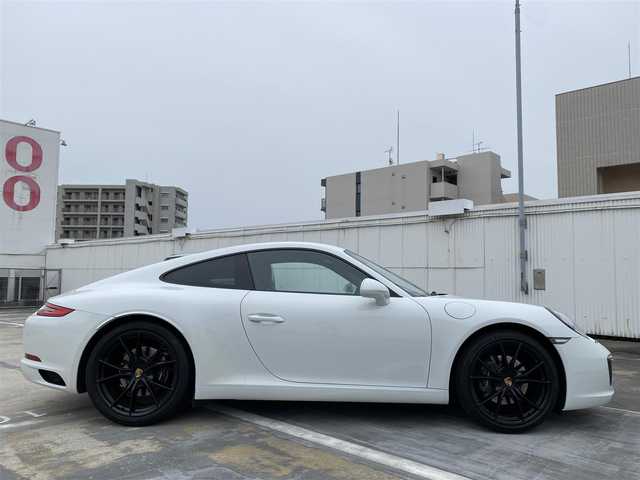 ポルシェ ９１１ カレラ 広島県 2016(平28)年 3万km 白 スポーツクロノパッケージ/スポーツエグゾーストシステム/GTスポーツステアリングレザー/　・インテリアパッケージ/ブラックペイント20インチアルミホイール/LEDメインブラックヘッドライト・PDLS含む/ポルシェエントリー・ドライブシステム/スポーツデザインエクステリアミラー/スマートキー・フロアマット/グレートップウィンドスクリーン/保証書あり/取り扱い説明書あり/純正ナビ/フルセグTV