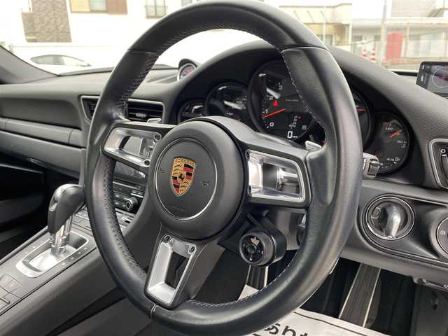 ポルシェ ９１１ カレラ 広島県 2016(平28)年 3万km 白 スポーツクロノパッケージ/スポーツエグゾーストシステム/GTスポーツステアリングレザー/　・インテリアパッケージ/ブラックペイント20インチアルミホイール/LEDメインブラックヘッドライト・PDLS含む/ポルシェエントリー・ドライブシステム/スポーツデザインエクステリアミラー/スマートキー・フロアマット/グレートップウィンドスクリーン/保証書あり/取り扱い説明書あり/純正ナビ/フルセグTV