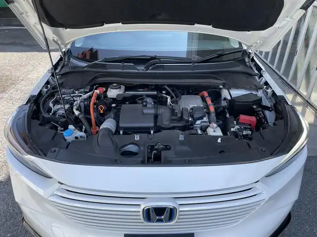 ホンダ ヴェゼル ハイブリッド e:HEV Z 東京都 2021(令3)年 3.3万km プラチナホワイトパール 純正9インチナビ/(フルセグTV/BT）/バックカメラ/ホンダセンシング/・衝突軽減ブレーキ/・誤発進抑制機能/・車線逸脱抑制機能/・追従機能付きアダプティプクルーズコントロール/・先行車発進お知らせ機能/ブラインドスポットモニター/後退時出庫サポート/前席シートヒーター/ステアリングヒーター/電装リアゲート/雨滴検知式フロントワイパー/アクティブコーナリングライト/純正18インチアルミ/置くだけ充電/ETC2.0/保証書/取扱説明書/スペアキー×1