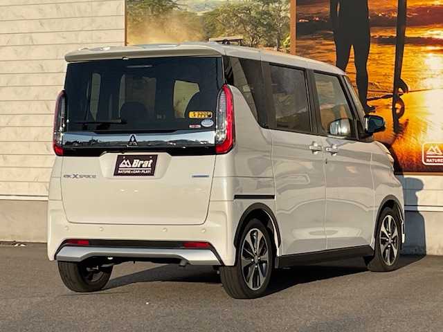 三菱 ｅＫクロススペース T 愛知県 2021(令3)年 1.3万km シルキーホワイト 外部検査実施済み/社外メモリーナビ/（BD/DVD/フルセグTV/Bluetooth/MSV）/レーダークルーズコントロール/両側パワースライドドア/アラウンドビューモニター/e-アシスト/・衝突被害軽減ブレーキアシスト/・踏み間違衝突防止アシスト/・車線逸脱警報システム/・車線逸脱防止支援機能/・オートマチックハイビーム/・ふらつき警報/・前方衝突予測警報/・標識検知/・先行車発進通知/ETC/前後ドライブレコーダー/前席シートヒーター/荷室スピーカー（ケンウッド）/LEDヘッドライト/スマートキー/パドルシフト/クリアランスソナー/カーテンエアバック/保証書/取扱説明書/スペアキー