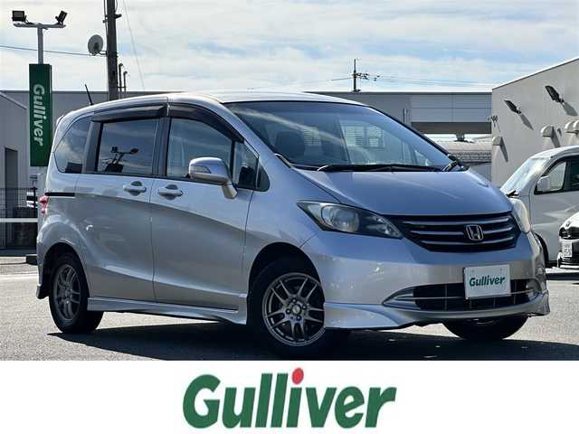 ホンダ フリード Gエアロ 鳥取県 2011(平23)年 15万km アラバスターシルバーメタリック 社外１５インチアルミ/純正メモリナビ/バックカメラ/ワンセグＴＶ　ＳＤ　ＣＤ/フロマアット/ドアバイザー/キーレス/リヤスポイラー