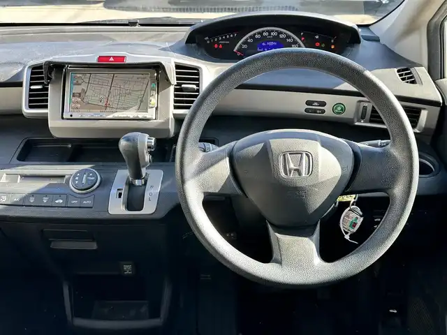 ホンダ フリード Gエアロ 鳥取県 2011(平23)年 15万km アラバスターシルバーメタリック 社外１５インチアルミ/純正メモリナビ/バックカメラ/ワンセグＴＶ　ＳＤ　ＣＤ/フロマアット/ドアバイザー/キーレス/リヤスポイラー