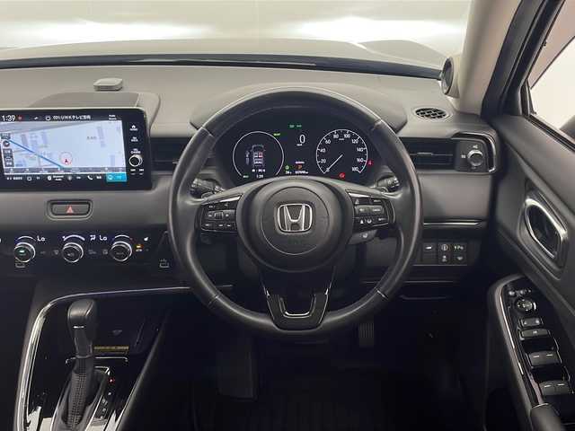 ホンダ ヴェゼル ハイブリッド e:HEV Z 宮崎県 2022(令4)年 3.7万km メテオロイドグレーメタリック 禁煙車/ホンダセンシング/純正9型ディスプレイオーディオナビTV/（HONDA CONNECT/Bluetooth/USB/フルセグTV)/純正ドライブレコーダー/純正ビルトイン2.0ETC/純正スカッフプレートイルミ/純正LEDオートライト/純正LEDフォグ/純正18インチアルミ/純正フロアマット/全方位モニター/アダプティブクルーズコントロール/レーンディパーチャーアラート/ダウンヒルアシストコントロール/クリアランスソナー/ブラインドスポットモニター/電子パーキング/オートホールド/パドルシフト/パワーバックドア/ステアリングヒーター/前席シートヒーター/ハーフレザーシート/スマートキー/プッシュエンジンスタート/新車時保証書/取扱い説明書